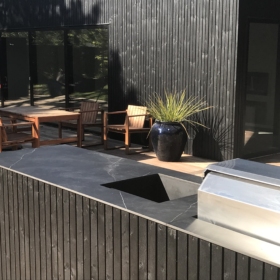 Outdoor kitchen worksurface made of ceramic material Storm Negro